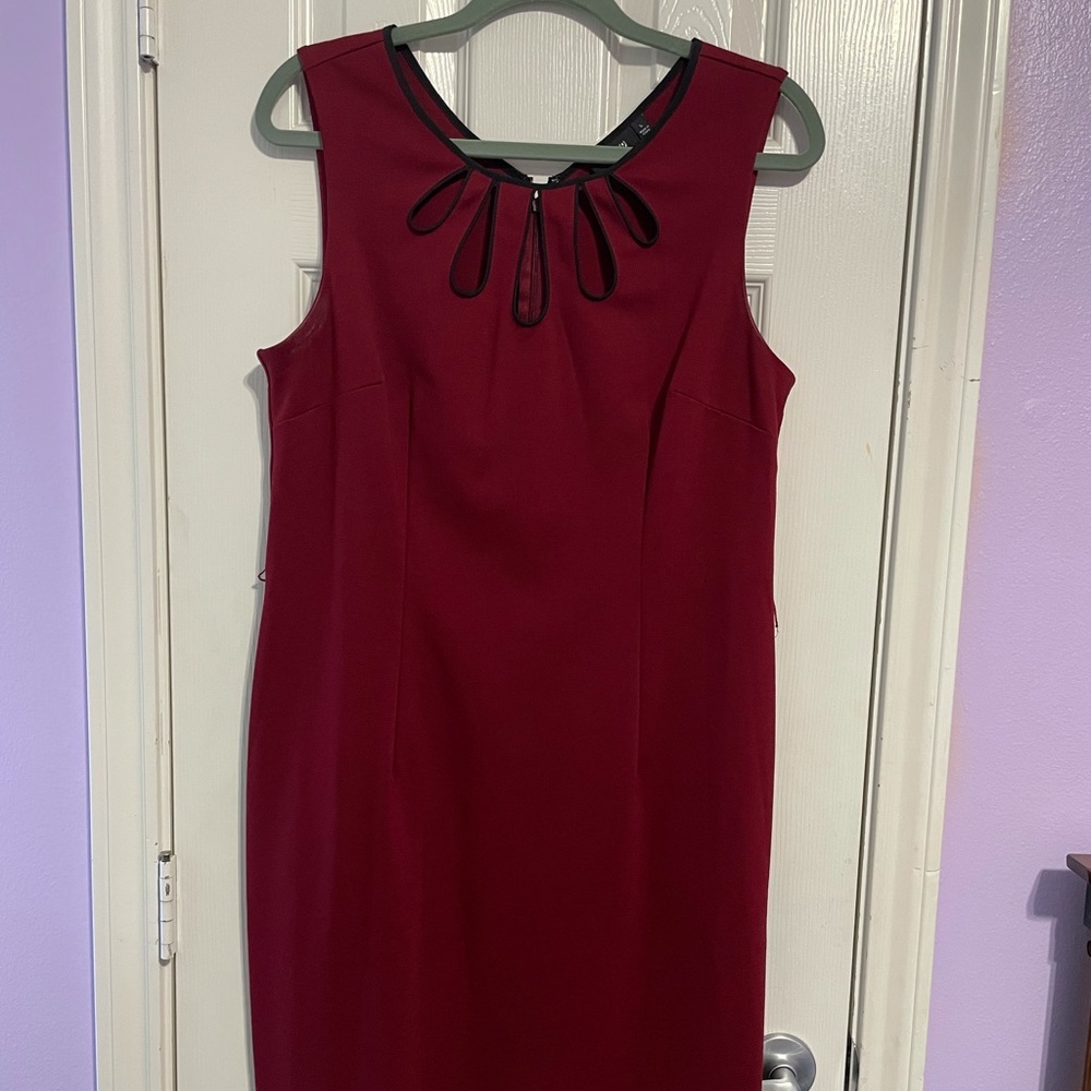 Red and black belted wear to work dress.